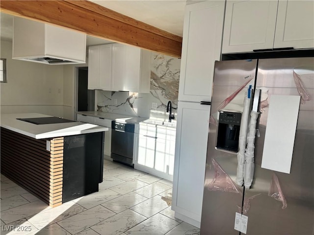 kitchen with beam ceiling, white cabinetry, sink, tasteful backsplash, and black appliances