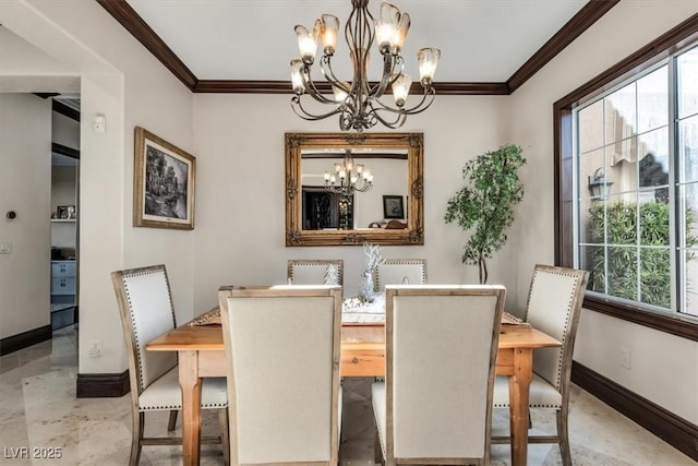 dining room with a notable chandelier and ornamental molding