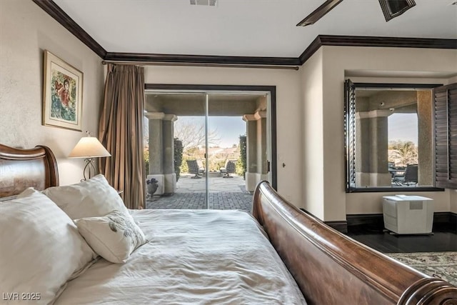 bedroom with ceiling fan, access to exterior, and crown molding