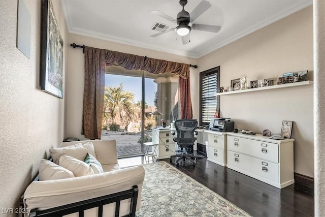 office space featuring dark hardwood / wood-style floors, ceiling fan, and ornamental molding