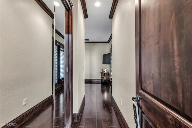 hallway featuring ornamental molding