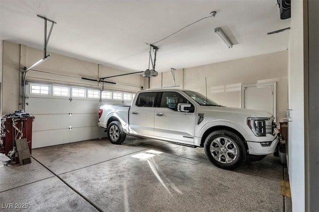 garage featuring a garage door opener