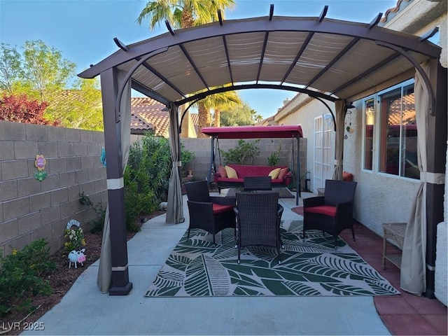 view of patio / terrace with a pergola and an outdoor hangout area