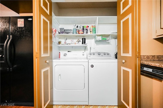 laundry room featuring washing machine and dryer