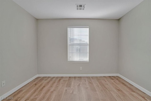 empty room with light wood-type flooring