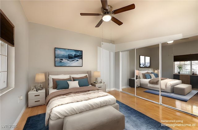 bedroom featuring ceiling fan, hardwood / wood-style floors, and a closet