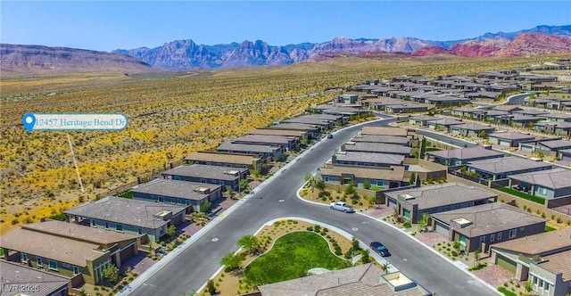 drone / aerial view featuring a mountain view