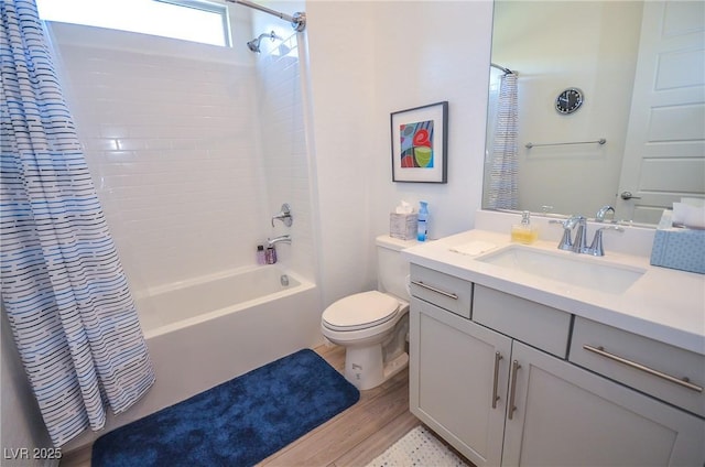 full bathroom with shower / bath combination with curtain, toilet, wood-type flooring, and vanity