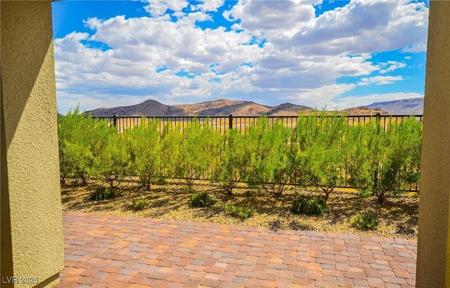 view of patio / terrace with a mountain view