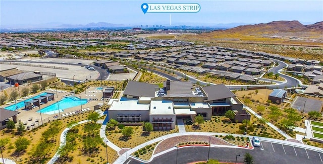 birds eye view of property featuring a mountain view