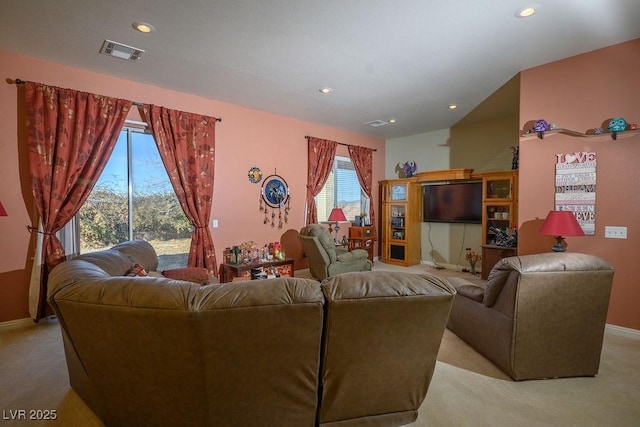 living room featuring light carpet