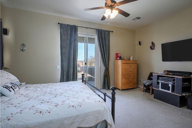 bedroom with access to outside, ceiling fan, and carpet flooring