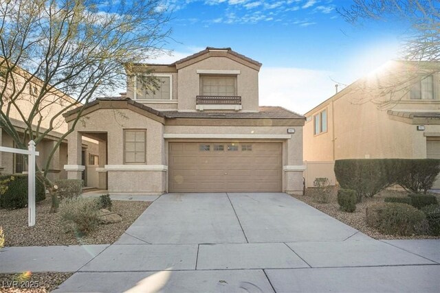 view of front of property with a garage