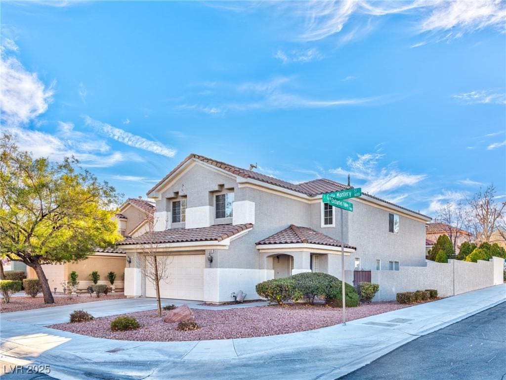 view of front of property featuring a garage