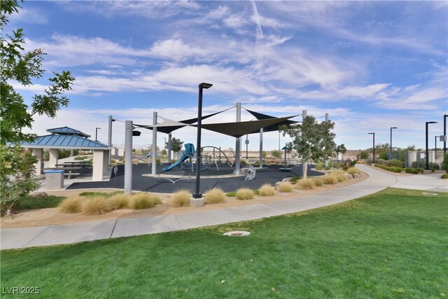 view of home's community featuring a gazebo, a playground, and a lawn