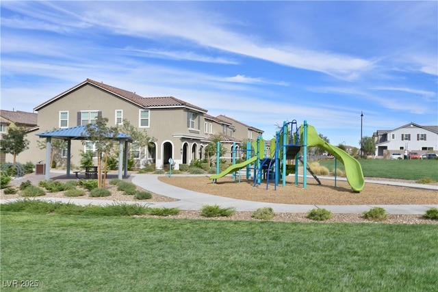 view of play area featuring a lawn