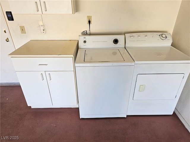 laundry room featuring cabinets and independent washer and dryer