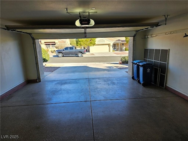 garage featuring a garage door opener