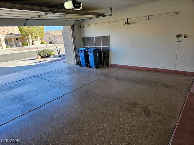 garage featuring a garage door opener