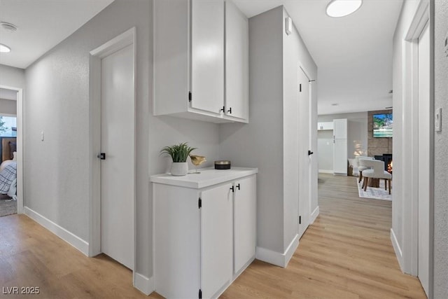 hall featuring light hardwood / wood-style flooring