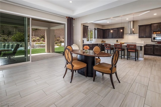 dining space featuring plenty of natural light