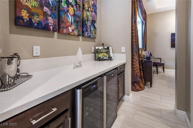 interior space featuring vanity and beverage cooler