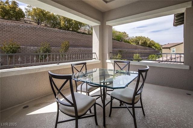 view of patio / terrace with a balcony