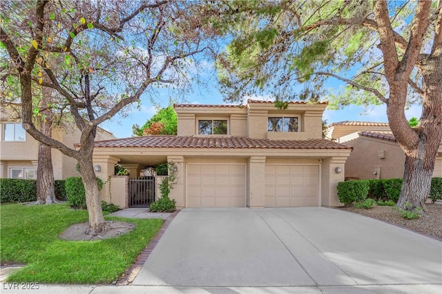 mediterranean / spanish-style home featuring a garage and a front lawn