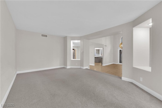 empty room featuring carpet floors