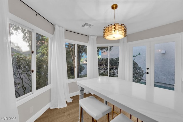 dining area featuring hardwood / wood-style floors