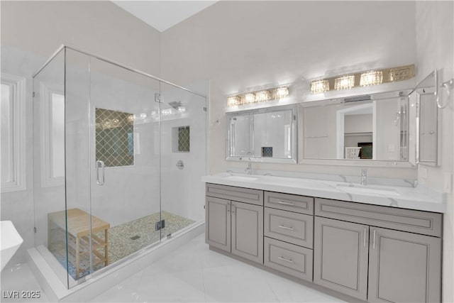 bathroom featuring tile patterned floors, vanity, and an enclosed shower