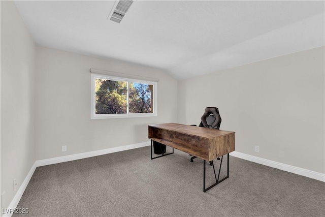 home office featuring carpet flooring and vaulted ceiling