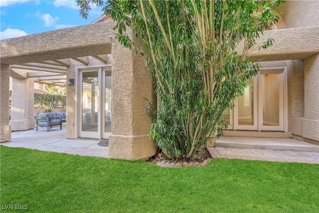 exterior space with a yard and a patio area