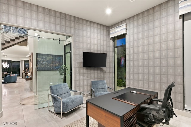 office space with tile walls