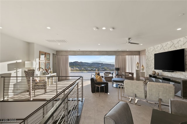 living room with ceiling fan