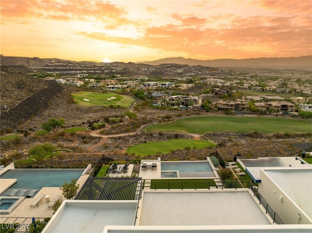 aerial view at dusk with a mountain view