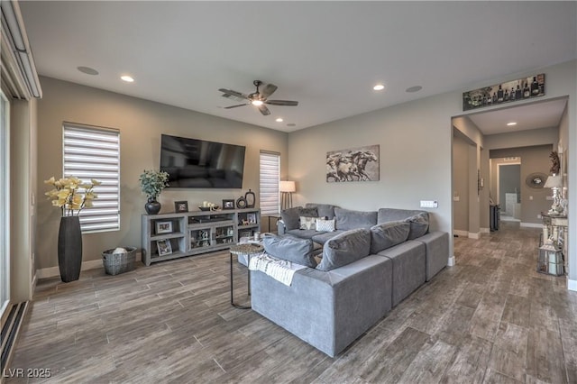 living room with ceiling fan