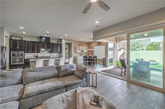 living room featuring ceiling fan