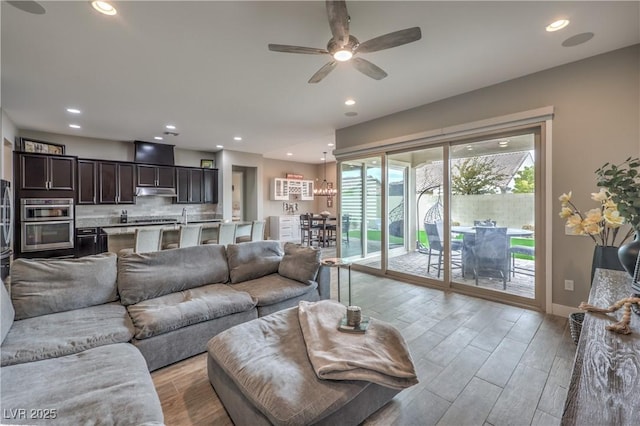 living room with ceiling fan