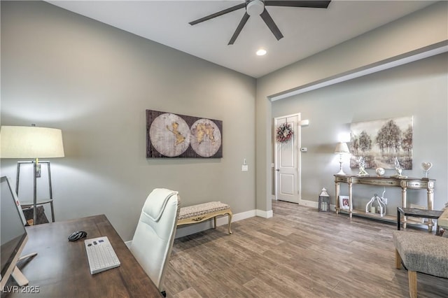 office space with ceiling fan and wood-type flooring