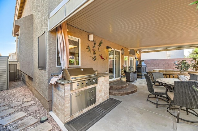 view of patio with area for grilling