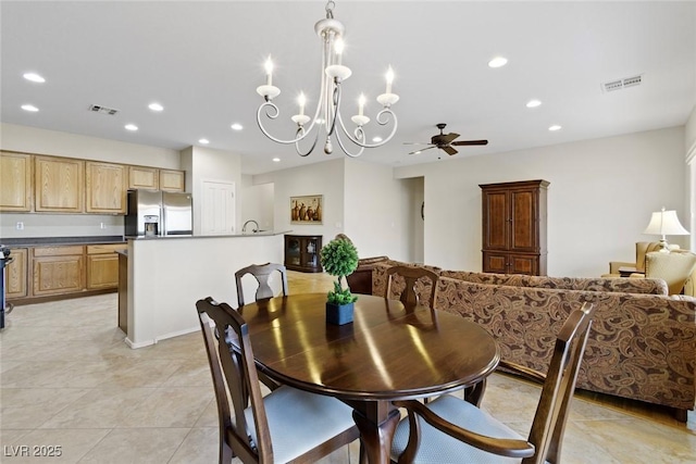 dining area with light tile patterned floors, visible vents, recessed lighting, and ceiling fan