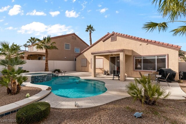 view of swimming pool featuring an in ground hot tub, central air condition unit, a patio area, and a grill