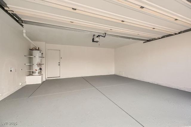 garage with a garage door opener and water heater