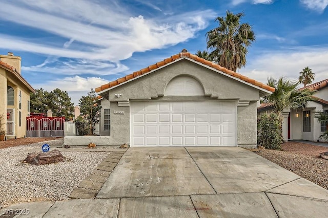 view of front of property with a garage