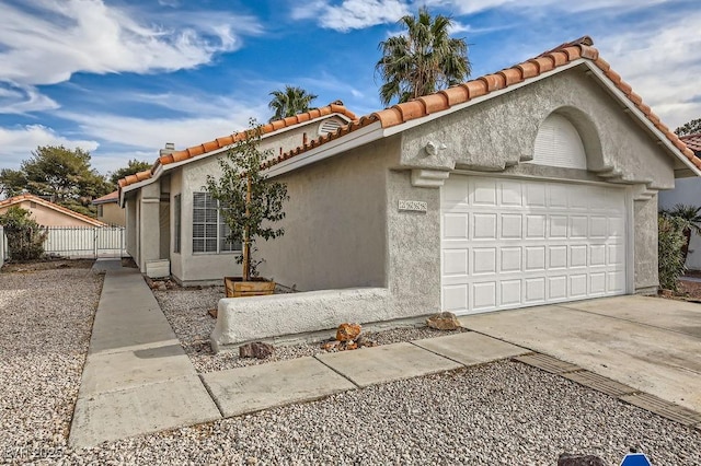 single story home with a garage