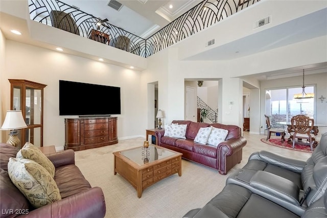 living room featuring a towering ceiling