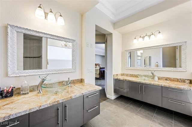 bathroom featuring tile patterned floors and vanity