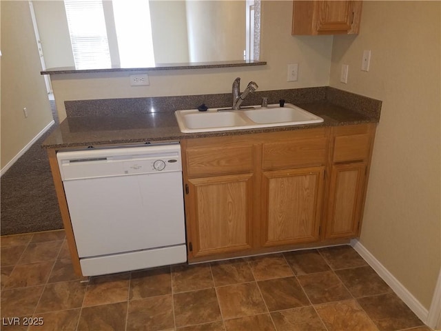 kitchen with dishwasher and sink