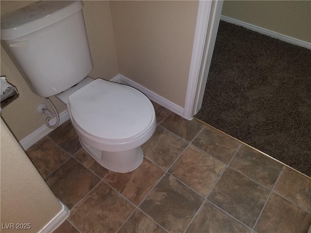 bathroom featuring toilet